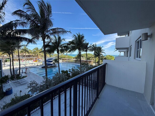 Building Photo - 9273 Collins Ave Unit 207