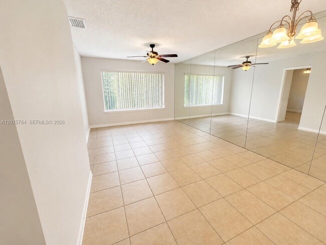Building Photo - 3280 NW 102nd Terrace Unit 203-E