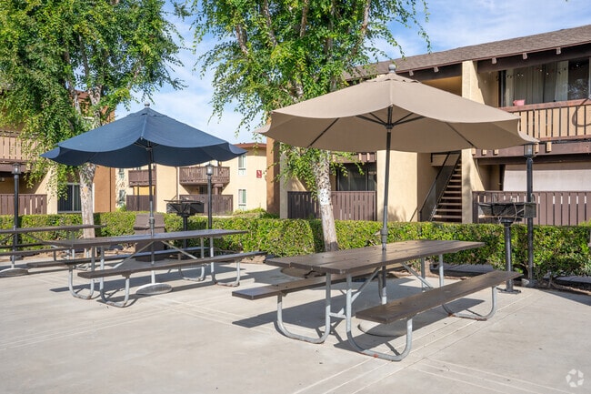 Picnic and barbecue area. - 105 Monterey Pines Apartments
