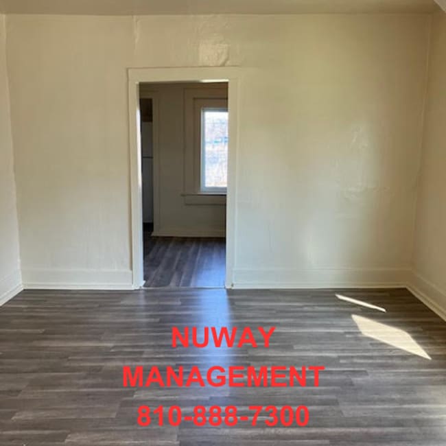 Photo - 810-888-7300