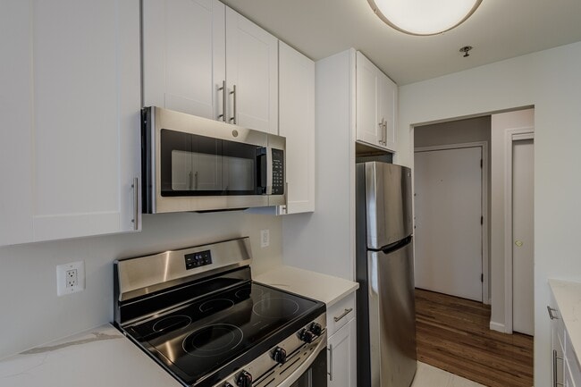 Elevate your lifestyle at Stanford Court Apartments, featuring modern kitchens with stainless steel appliances and sleek cabinetry. Enjoy convenience and style in a vibrant community. Schedule your tour today to see your new home!