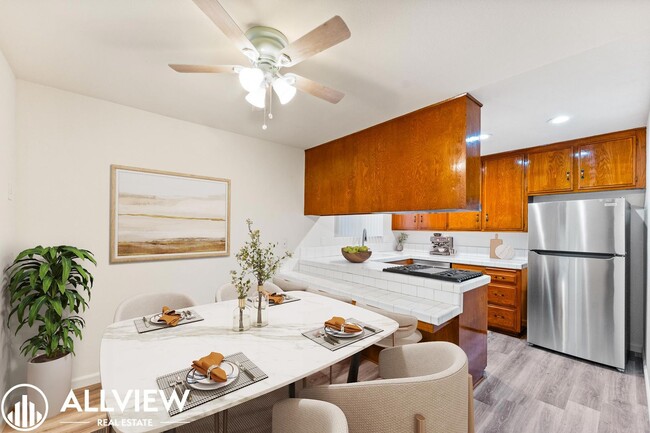 Building Photo - 7572 Amazon Dr Unit 4