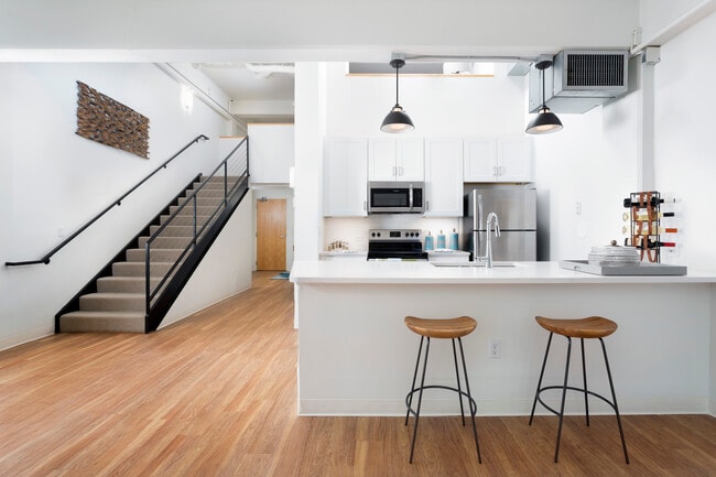 Renovated Unit Featuring Upgraded Lighting and LVT throughout the Kitchen and Living Room