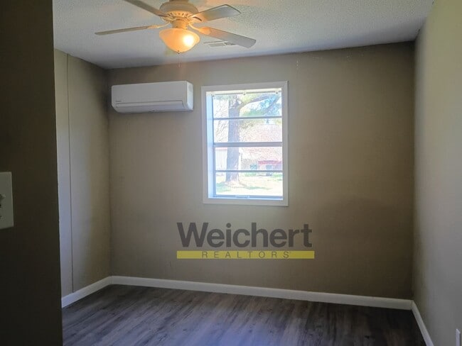 Photo - Spacious 4BR Home – Walk-In Closet & W/D Hookups