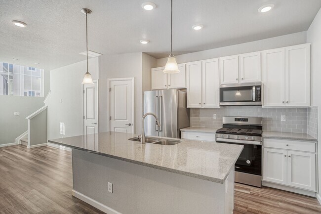 Photo - Evolve Real Estate: Spacious 3 Bed 2.5 bath Townhouse with Attached 2 Car Garage AVAILABLE NOW!