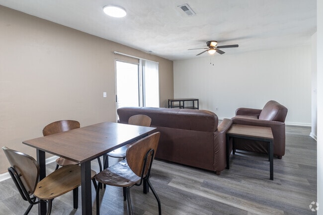4BR, 2BA - 1,194SF - Dining Room - The Hills Northview Apartments