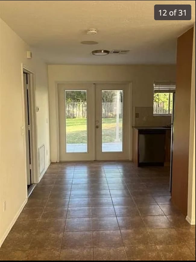 Photo - 2/2/1 home with a spacious fenced backyard...