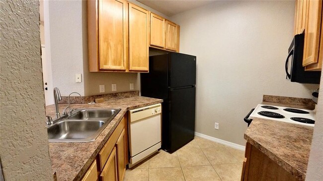 Photo - 10017 Courtney Palms Blvd Unit 304