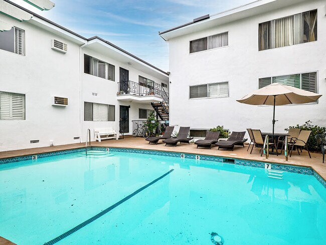 Large outdoor pool with lounging space.