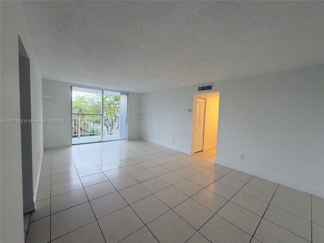 Photo - 498 NW 165th St Apartment Unit D-302