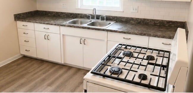 Photo - Charming 3-Bedroom Home with Hardwood Floors, Garage & Private Patio