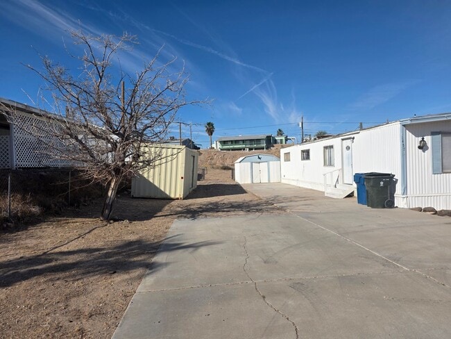 Photo - LAND, LAND AND MORE LAND! 2 bed/2 bath Manufactured home in Bullhead City on Huge double lot!