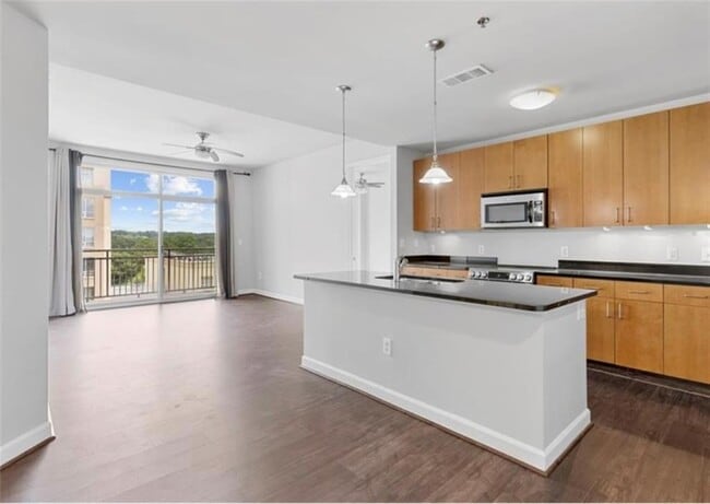 Building Photo - 711 Cosmopolitan Dr NE Unit 600 Rental