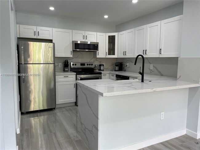 Building Photo - 2031 Renaissance Blvd Unit 101