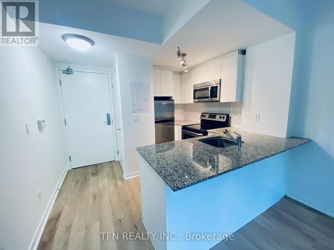 55 E Liberty St Unit 211