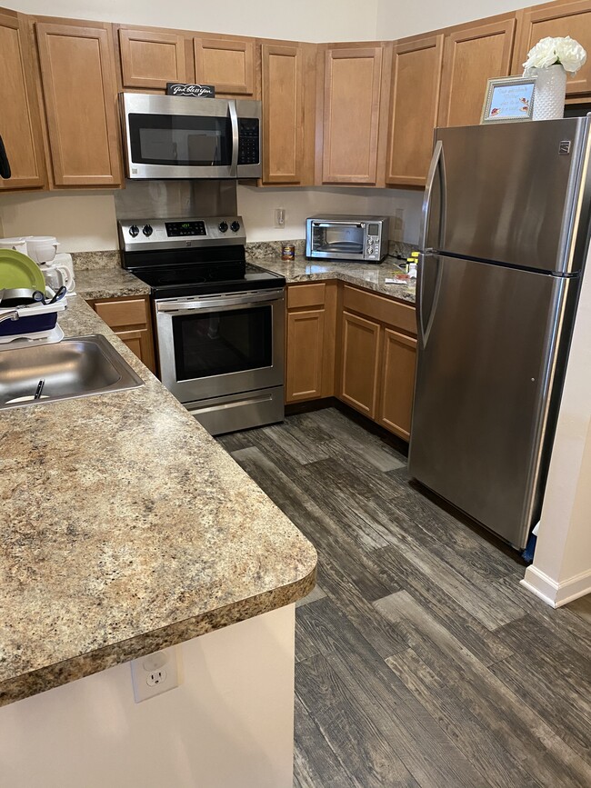 Upgraded unit kitchen - Sunnyside Apartments