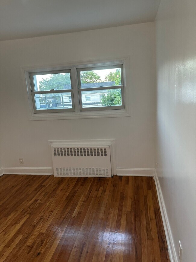 Photo - 103 E 218th St Unit 2