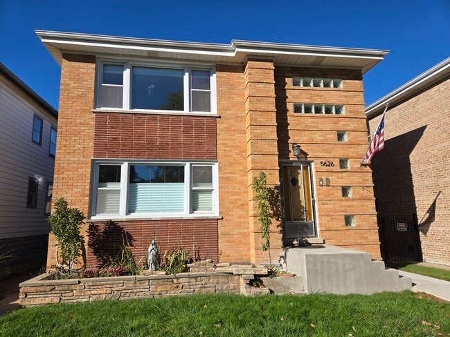 Building Photo - 5626 N Menard Ave Unit 2