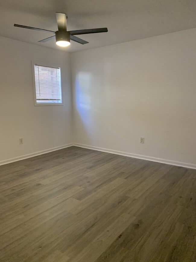 "Charming 2-Bed Oasis in the Heart of Jonesboro – Spacious 720 sq. ft. Living at Vine Street Apar...