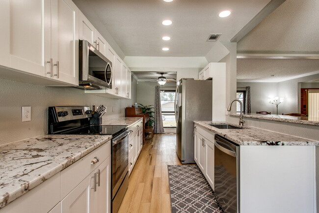 Photo - "Charming 3-Bedroom Haven with Cozy Fireplace in San Antonio – 1570 Sq Ft of Comfort!"