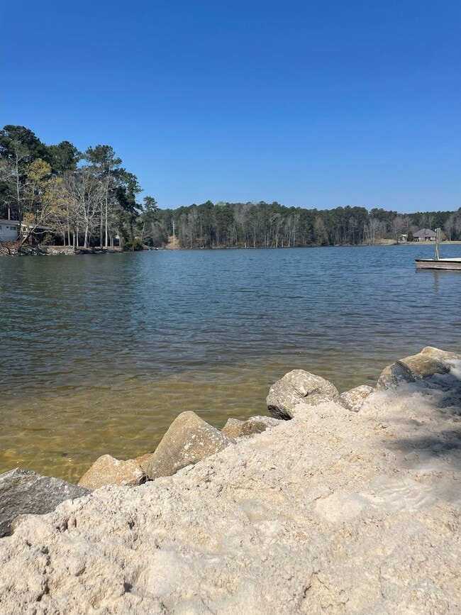 Photo - Partially Furnished Lakefront Retreat in Sunset Bay – Stunning Views & Resort-Style Amenities