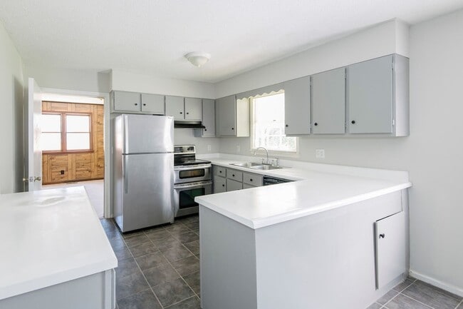 Photo - Adorable ranch home with huge fenced yard mid June!