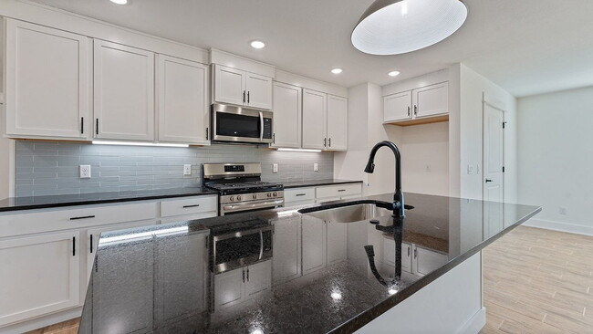 Photo - "Brand New 3-Bedroom Farmington Home with Granite Countertops and Cozy Fireplace!"