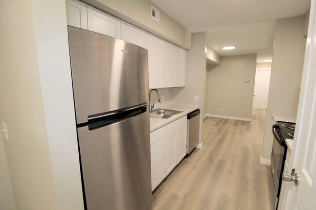 Photo - Stunning Fully Remodeled 3BR Condo at Madison Manor – Available This July!