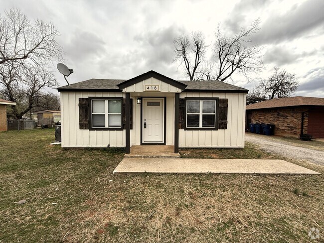 Building Photo - Take a Look at This Cute and Cozy Home in ...