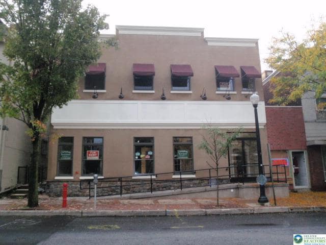 Building Photo - 128 W 4th St Unit 2L