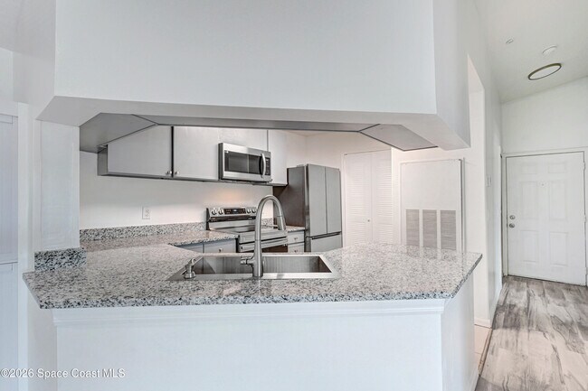 Photo - 7667 N Wickham Rd Unidad 1309