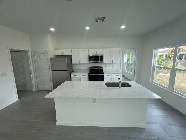 Photo - BRAND NEW CONSTRUCTION! GORGEOUS 4 BD/ 2BA HOME IN LEHIGH ACRES