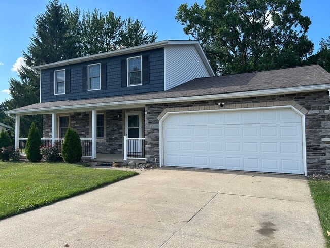 Building Photo - 3 Bedroom Stone Facade Colonial with 2 Car Attached Garage in Strongsville