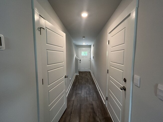 Photo - Welcome to this brand new end unit townhome that combines modern convenience with style and charm...