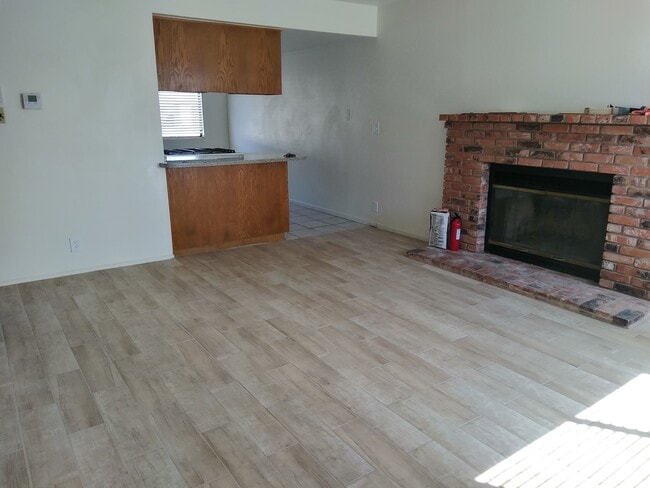 Living Room with fireplace - 437 S Sunset St Unit C