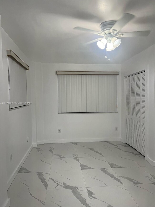 Building Photo - 9920 SW 32nd St Unit FRONT