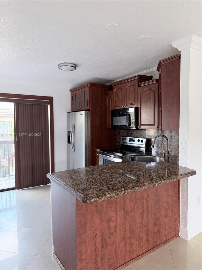 Building Photo - 5460 W 21st Ct Unit 413