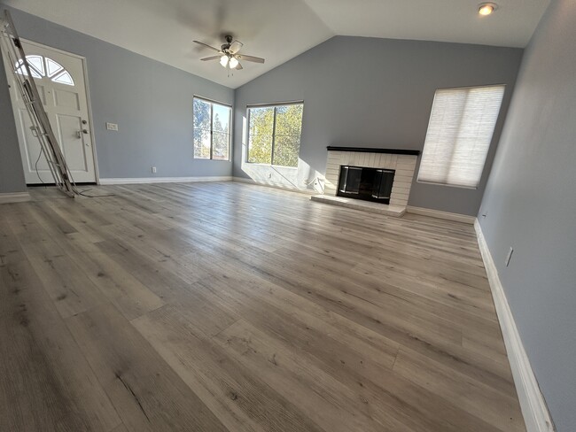 Main room with views and gas fireplace, ceiling fan, track lighting - 3 Vista Barranca Unidad Corner Condo