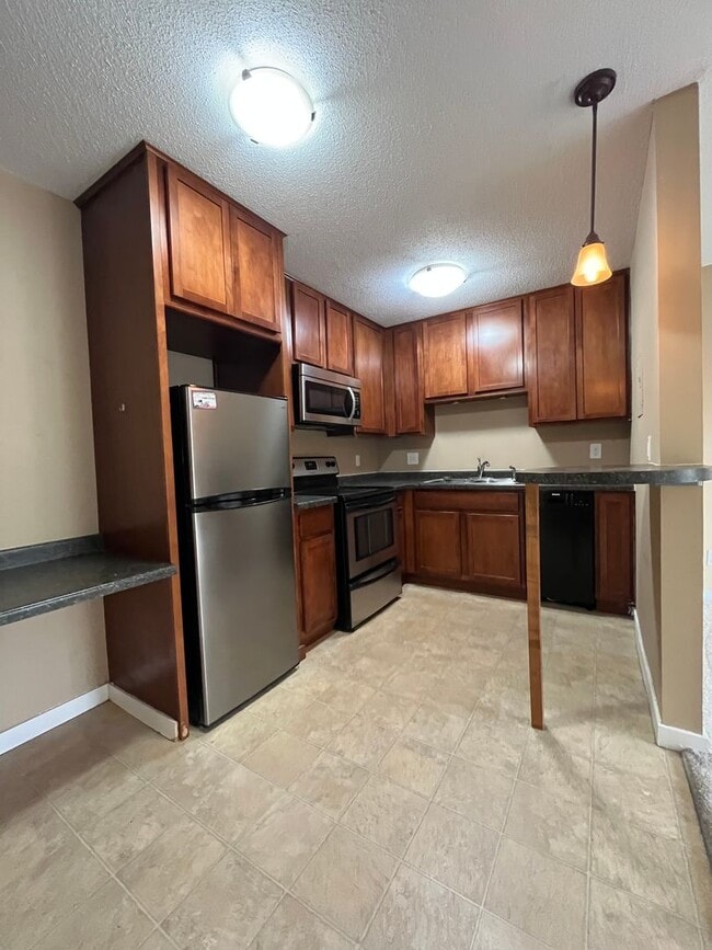 Building Photo - 3729 Snelling Ave Unit 1