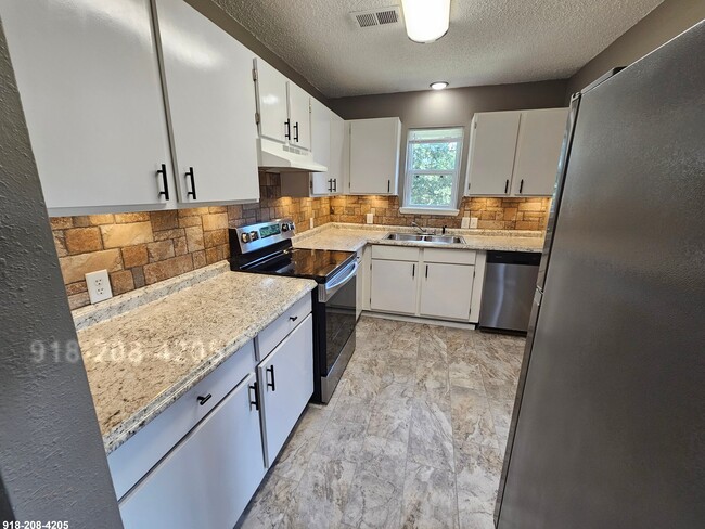 Photo - 1601 N Hills Blvd Unit 1603 N Hills Blvd