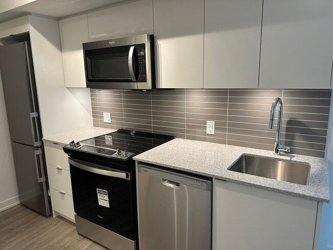 Photo - Contemporary 1-Bdrm + Den + 1 Parking Spot Condo for Rent in North York!