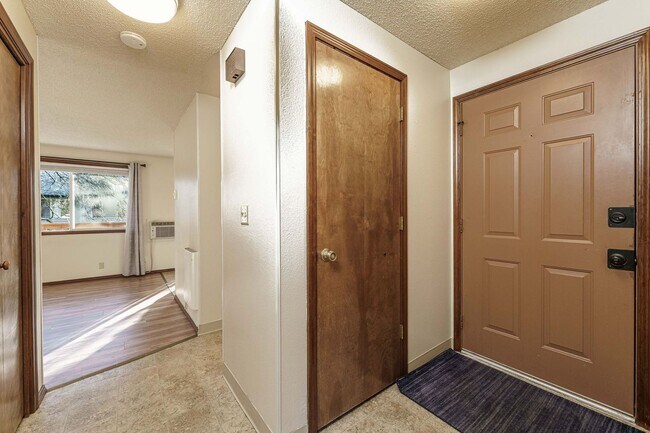 Photo - Updated 1 Bed / 1 Bath Upper-Level Condo with Balcony, Garage & A/C — Gated Community! Unit 32