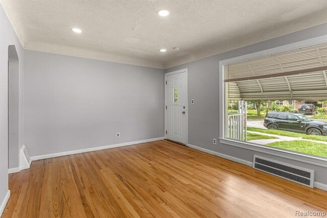 Photo - Cozy & Modern: 2-Bed Brick Home with Garage & Finished Basement