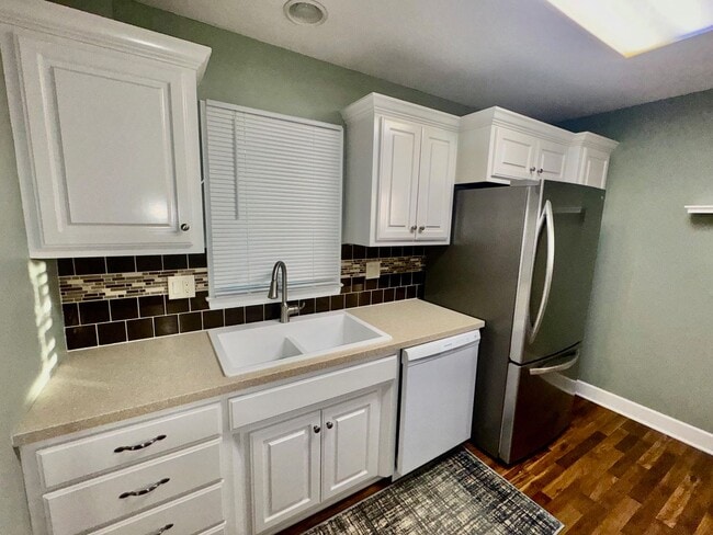 Photo - Bright and Spacious 3-Bedroom Home with Flexible Living Space