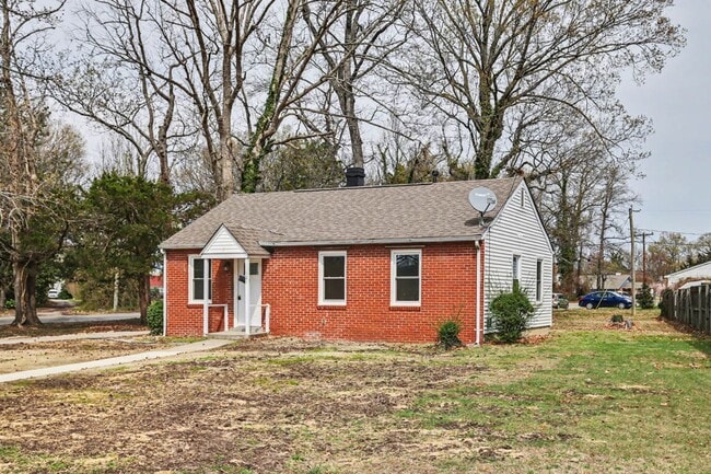 Photo - Renovated 3-Bedroom Home with Spacious Yard & Detached Garage