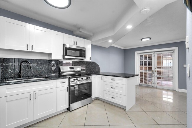 Building Photo - 5335 W 23rd Ct Unit 13-4