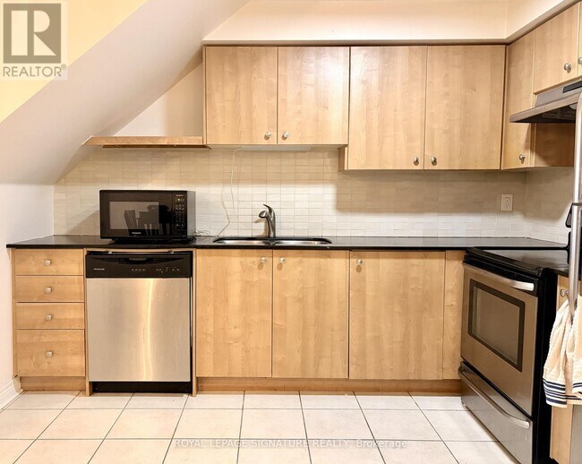 Photo - 6063 Kingston Rd Unité 7