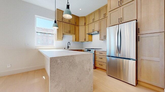 Photo - Modern, Convenient, Bright, Renovated 3BR/1BA Top Floor Flat with Dishwasher & In Unit Laundry