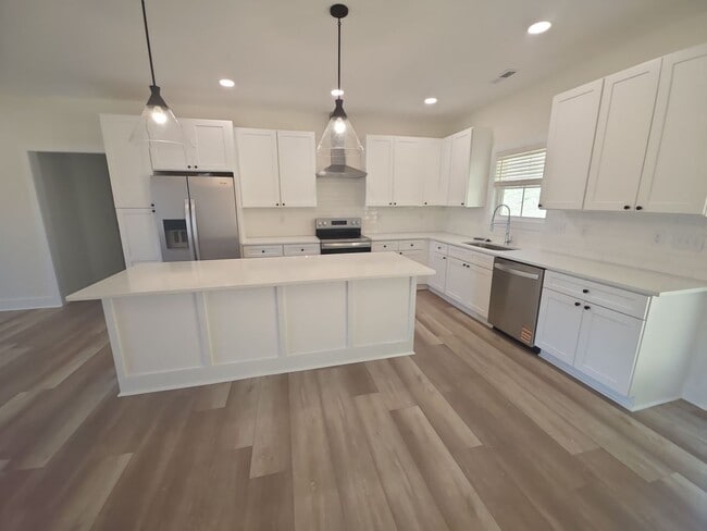 Photo - Brand-New 3-Bedroom Single-Level Home with 2-Car Garage and Maintenance-Free Living