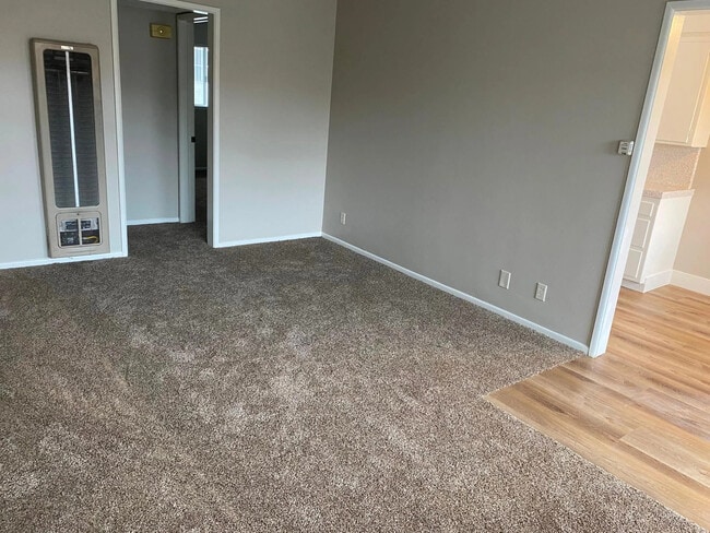 Sala de estar - Green Oaks Apartments, LLC.